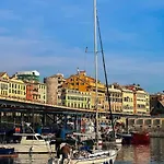 Overlooking The Porto Antico Of Genoa